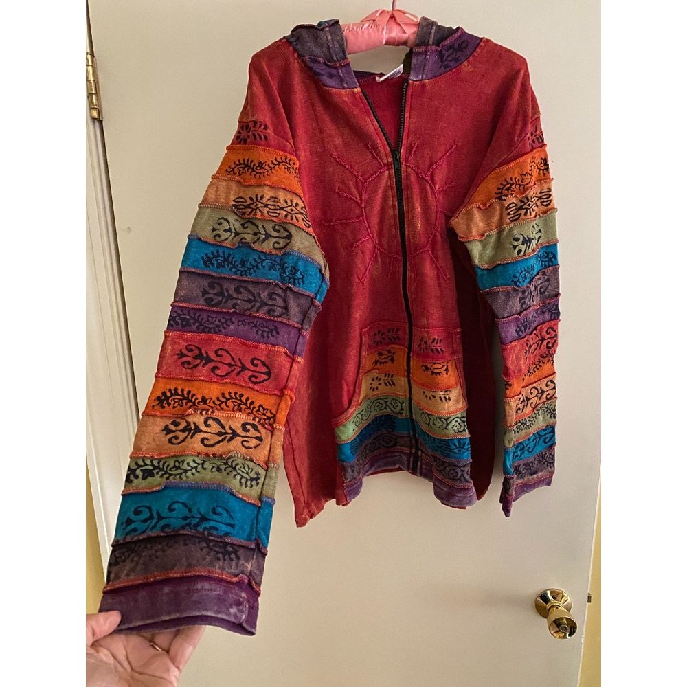Greater Good Multi-color jacket with hood, never worn. Size XXL
